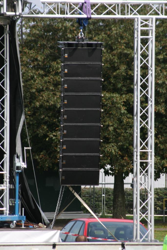 Crowpoint Festival.  A close up of 8 x Martin Audio W8LM Line Array Elements + 1 W8LMD Downfill, hung from PA wings attached to the stage.                